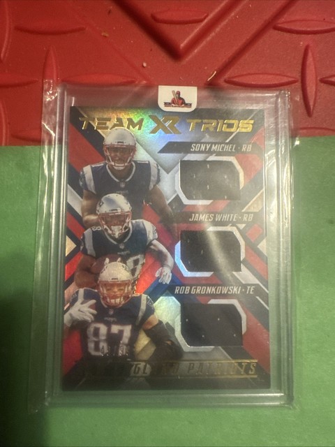 2018 Panini XR Team Trios Materials Blue Rob Gronkowski/Michel/White 49/99 Pats
