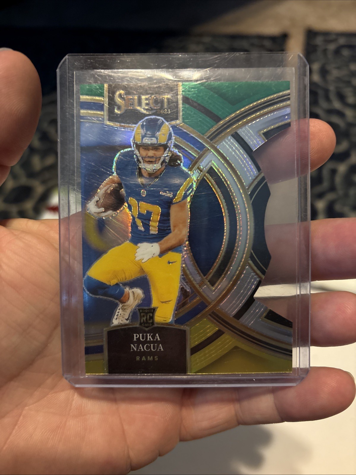 2023 Panini Select Premier Level Puka Nacua #199 Black Green Prizm Die-Cut (RC)