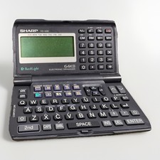 Sharp YO-430 64KB Electronic Organizer Vintage Digital PDA Calculator