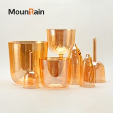 A set of four types of crystal singing bowls for sound therapy with accessories