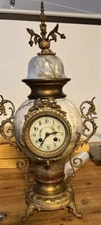 Japy Freres porcelain urn shaped mantel clock