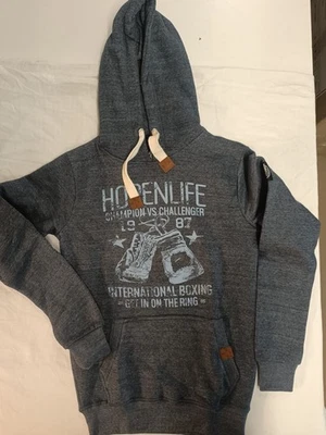 SWEAT CAPUCHE AVEC SERIGRAPHIE POCHES DEVANT - Photo 1/4