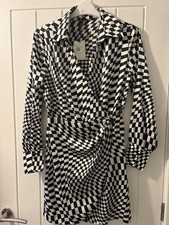 Lady?s black and white Mable design dress in size 8-10. New with tags