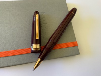 Omas Ogiva Oversize Burgundy And Gold Rollerball Pen