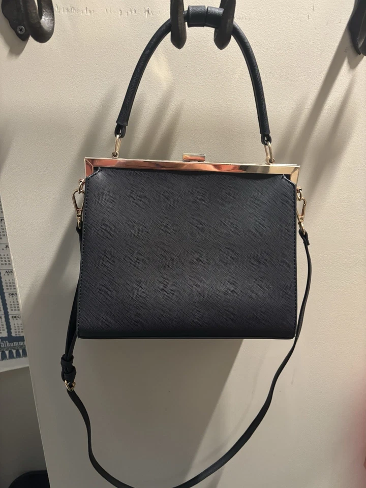 Bolso de hombro de cuero para mujer Dune London negro y pelo de vaca estilo leopardo Foto 2 de 4