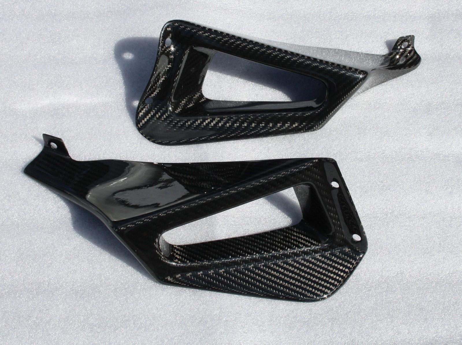 Écopes jaunies ? Les entrées d'air Buell XB12Ss carbone brillant résolvent le problème