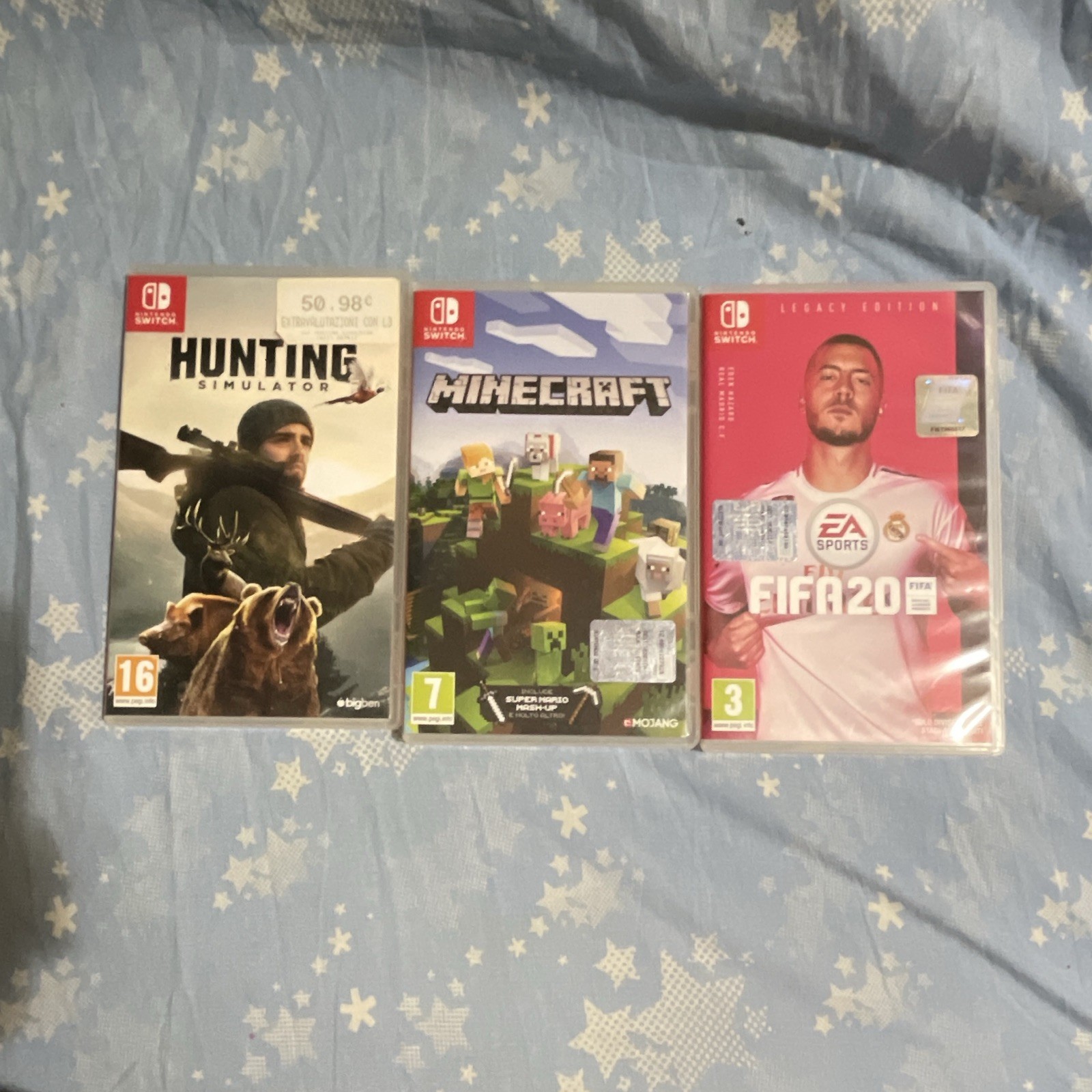 Nintendo Switch lotto 3 giochi PAL: Minecraft, FIFA 20 EA SPORTS, Hunting Sim