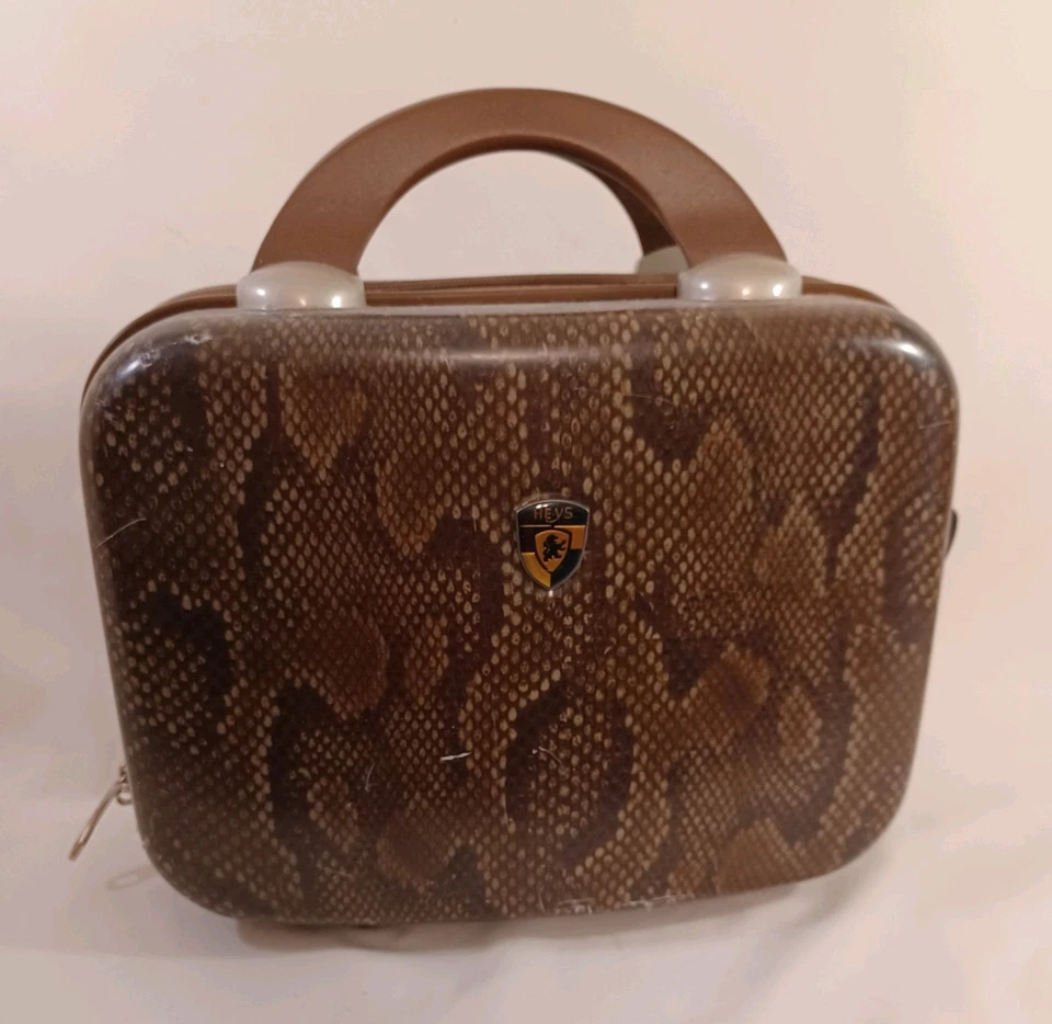 Estuche cosmético de viaje de maquillaje rígido piel de serpiente Heys para pasar la noche vintage marrón tostado Foto 3 de 4