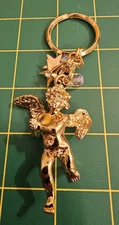 KIRKS FOLLY GOLD TONE ANGEL CUPID PENDANT STARS CRYSTALS 