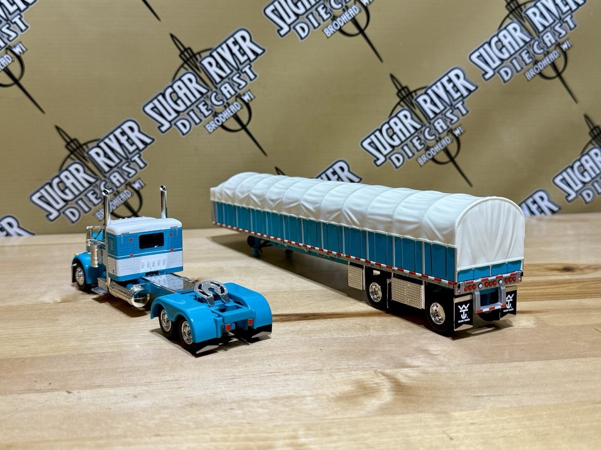 DCP 1/64 Peterbilt 379 Flattop With Covered Wagon Semi Truck Farm