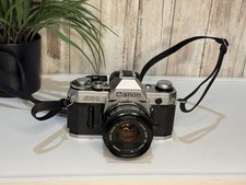 Canon AE-1 35mm Film SLR Camera with FD 50mm f/1.8 S.C. Works perfectly,  zoom.