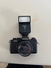 Yashica FR I 35mm SLR Film Camera w/ Yashica ML 50mm f/1.9 Lens   Tested