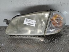 Feu avant (phare) Mazda 323