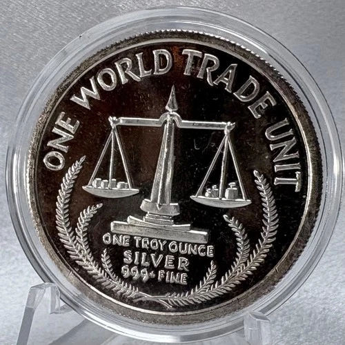 1985 One World Trade Unit 1oz .999 Fine Silver Eagle Round [J12]
