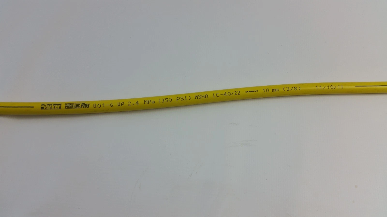 Parker Push-Lok Plus logo and 801-6 rating printed along the hose