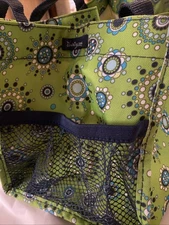 Thirty one small utility tote with two mesh pockets and handles