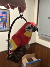 Repeat Talking Parrot on a Perch 2018 PMT Holdings LTD Tested