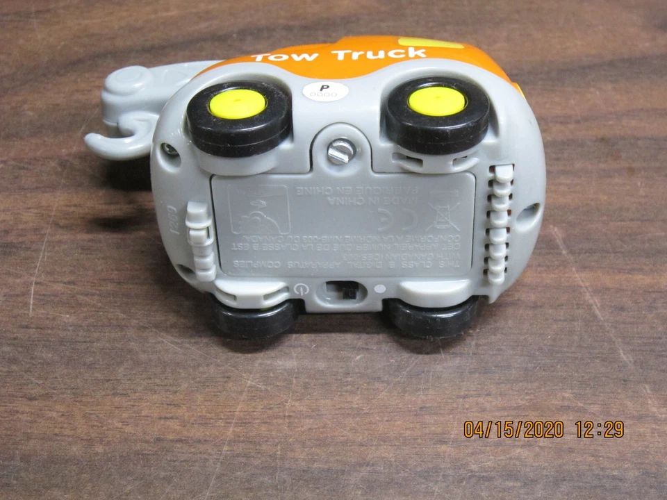 Remolque V-tech naranja ruedas negras juguete divertido rollos luces sonidos gancho vehículo Foto 4 de 4