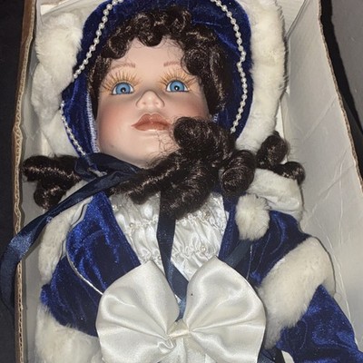 Porcelain Girl Doll Brown Eyes Dark Brown Curly Hair Blue Velvet Faux Fur Coat