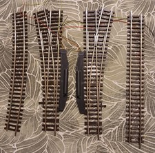 Dos desvios Roco H0 42442 y 42443 con motores y unas vias