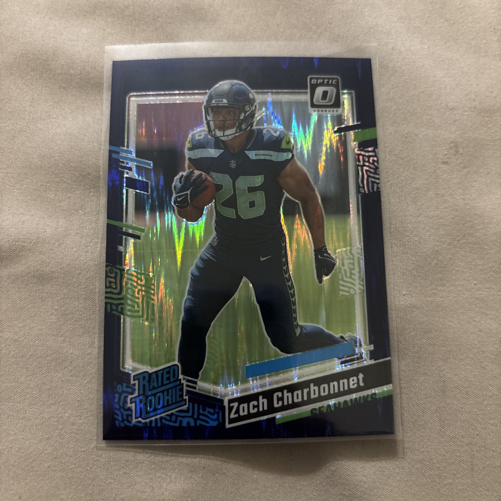 2023 Panini Donruss Optic -Rated Rookie Purple Shock Prizm #294 Zach Charbonnet