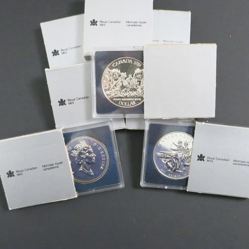 8 Canadian Silver Dollars – 50% Silver – 1987–1992 – Capsules – Bulk Silver Lot