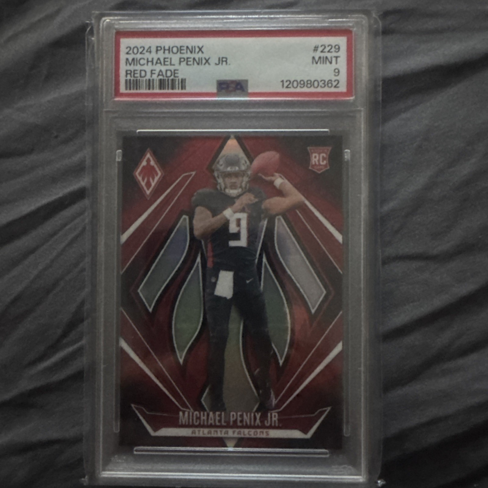 2024 Panini Phoenix - Rookies Michael Penix Jr. #229 Red Fade /299 (RC) PSA 9