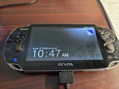 Playstation Vita Console + Charging Cable, Game Case And 8GB Memory Card