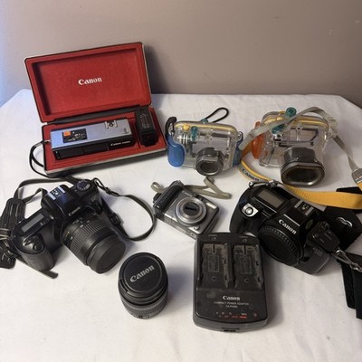 Lot of 8 Vintage Canon brand products Cameras, Lenses and accessories untested