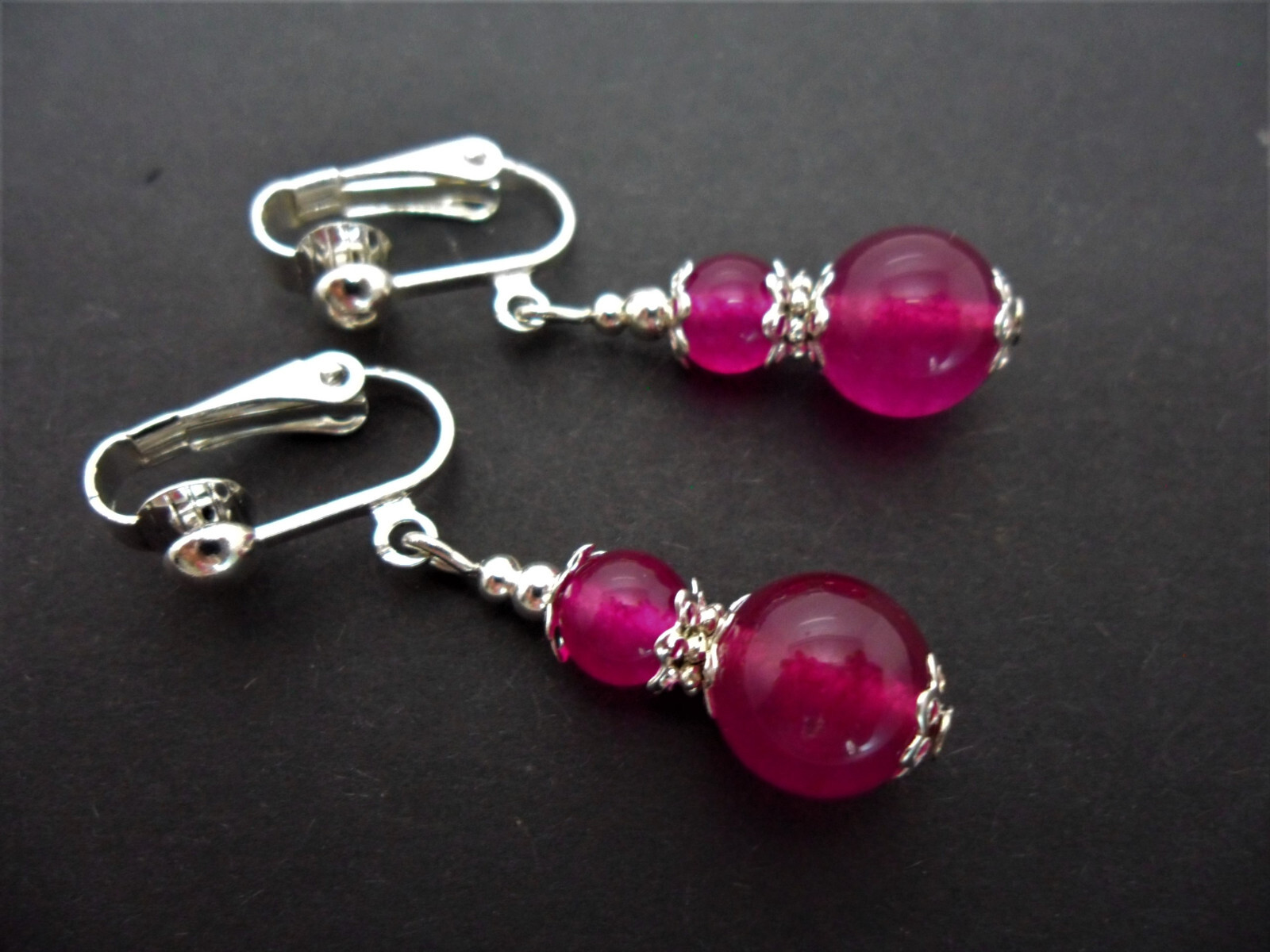 A PAIR OF FUCHIA BRIGHT PINK JADE DANGLY  CLIP ON  EARRINGS. NEW.