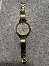 Anne Klein Women's AK/1254 Gold-Tone Bangle Watch