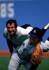 New York Yankees manager Billy Martin and Reggie Jackson joking ar- Old Photo