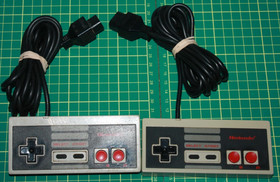 Nintendo Entertainment System NES with 2 Controllers and Super Mario Bros Game