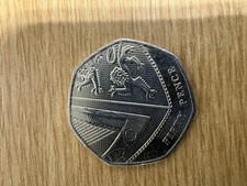 A British 50 pence coin featuring the Shield of the Royal Arms Very Collectable