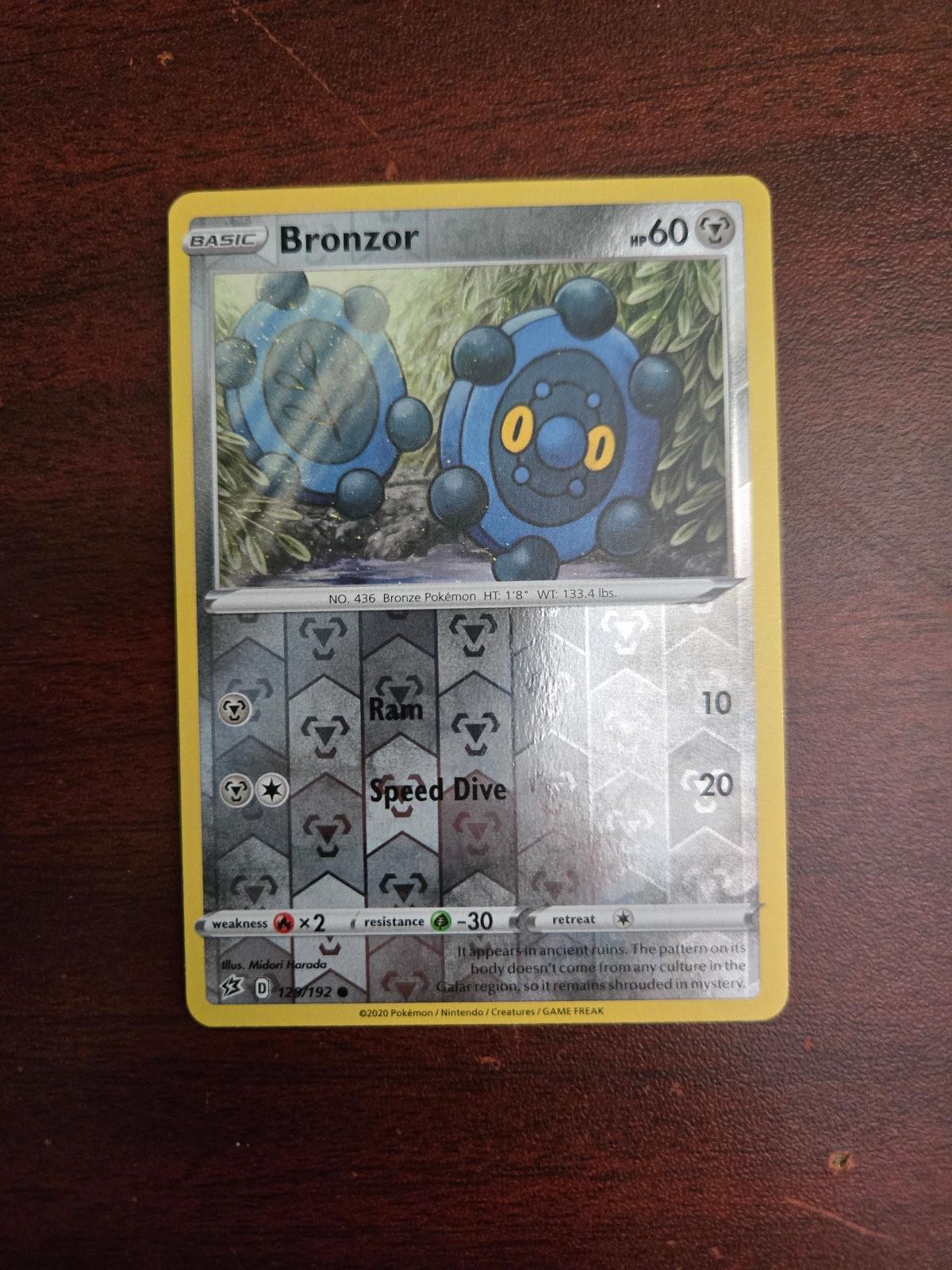 Bronzor 129/192 Common Rebel Clash Pokemon Reverse Holo Near Mint