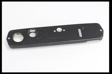 208118 OLYMPUS OM-2S PROGRAM BOTTOM COVER REPAIR PART USED