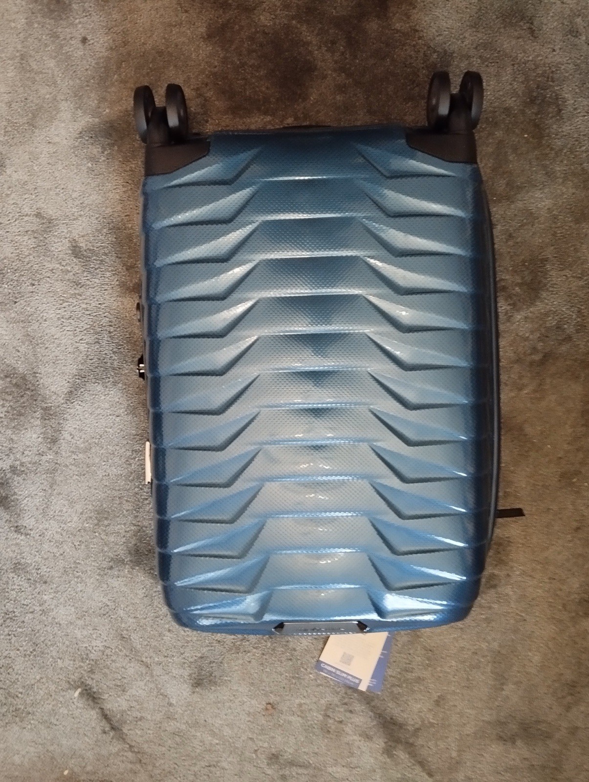 L'excellence du voyage : Valise rigide Samsonite ROXKIN™ extensible en bleu pétrole raffiné