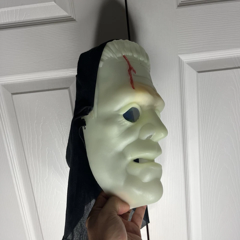 Glow-in-the-Dark Monster Mask With Holographic Eyes Black Hood & Elastic Strap - Image 2 of 4