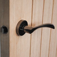 ONYX Twirl Push Button Privacy Lever on Rose Door Handle Only