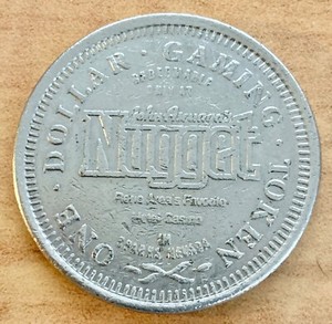 Nugget Casino Hotel Gaming Token and Matches from the early 1990's