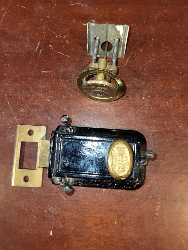 Russwin surface mount dead bolt with key cylinder and strike plate