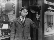 Eighteen year old inventor, H Day wearing headphones attached wire - 1922 Photo