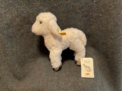 Steiff Lamb  Dossy  #073076  color is white with green eyes brass button ex cond