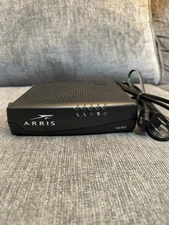 ARRIS TM1602A Cable Modem DOCSIS 3.0 with power cord.  