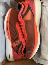 PUMA Liberate Nitro Lava Blast/White Men s Ru...