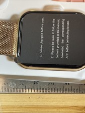 Smart Watch Fitness Tracker With A Gold And Pink Band For Android Or IPhone