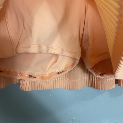 Falda plisada a calle Lululemon tiro medio en verano naranja claro brillante talla 10 - Imagen 3 de 5