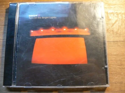 ALBUM CD - INTERPOL - TURN ON THE BRIGHT LIGHTS - - Photo 1/3