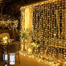 JMEXSUSS 300 LED Remote Control Christmas Curtain Lights, Plug in Fairy Curt...