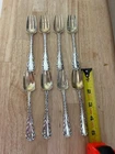 8 whiting/gorham sterling spoons w/ gold wash.. beautiful details 5”